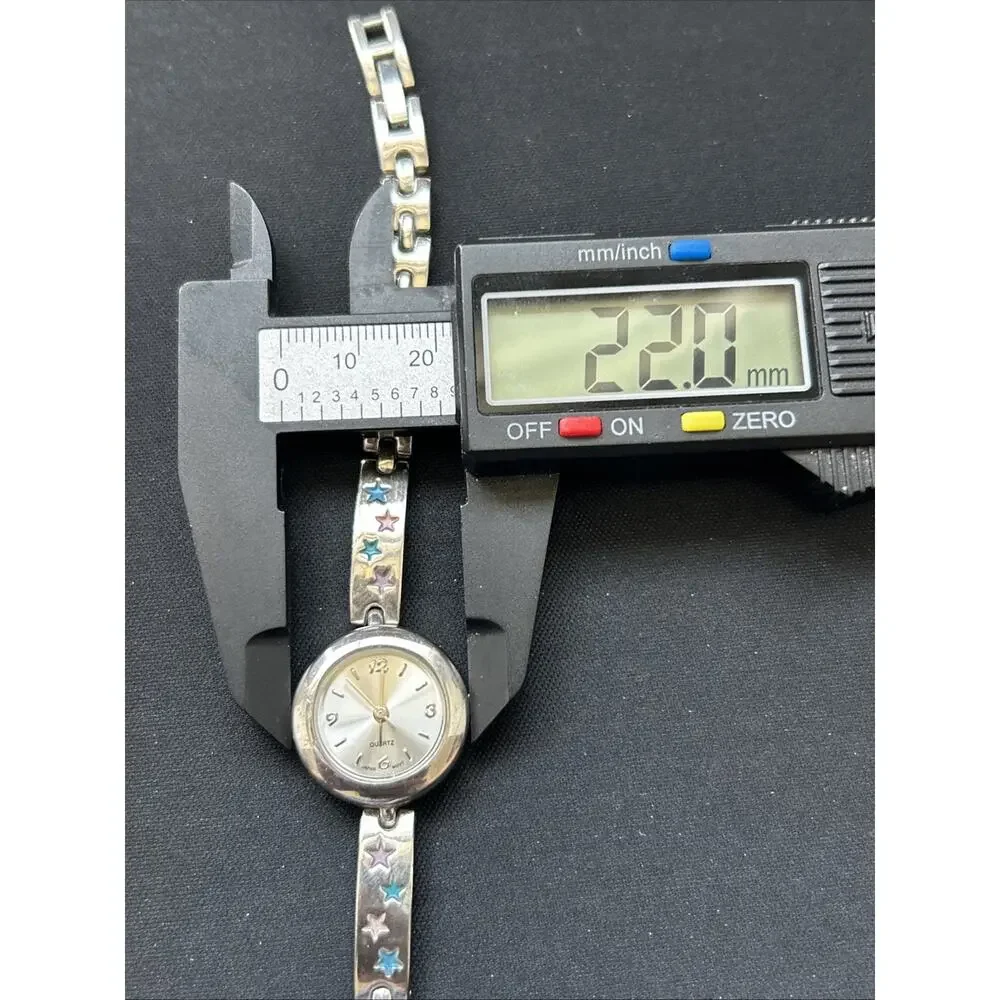 Silver Tone Multicolored Star Band Women’s Quartz Watch